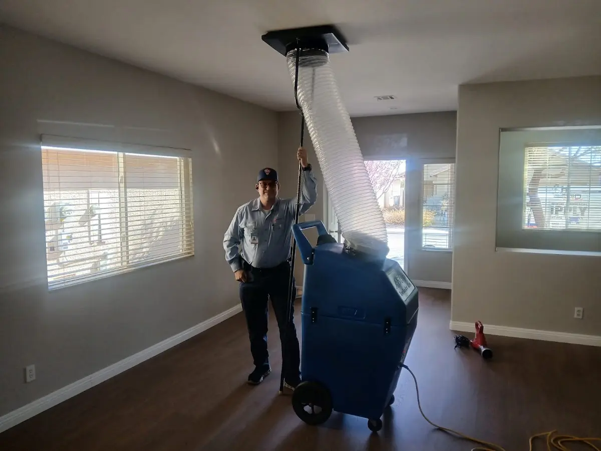Professional Dryer Vent Cleaning work inside a New Richmond home